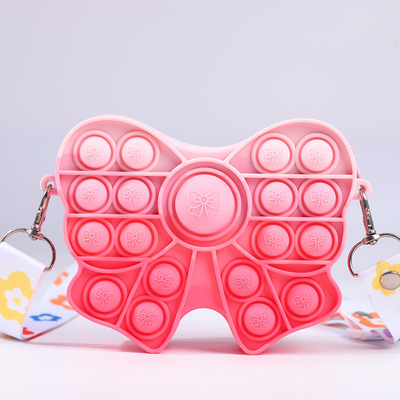 Bom preço. Bolsa Fidget Pop Bolsa Bow Meninas Bolsa Prêmio de Páscoa Sensorial Fidget Toy Silicone Corpo Cruzado Crianças Bolsa Caixa Lápis Maquiagem Saco on-line